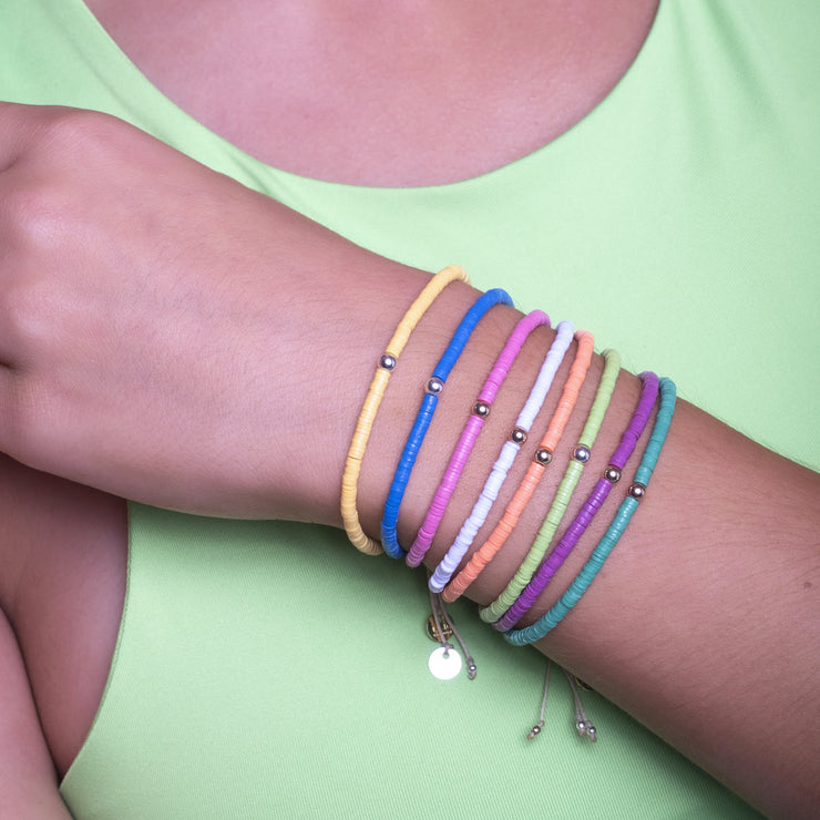 Handwoven Coral Bracelet In Orange Featuring A Gold Bead