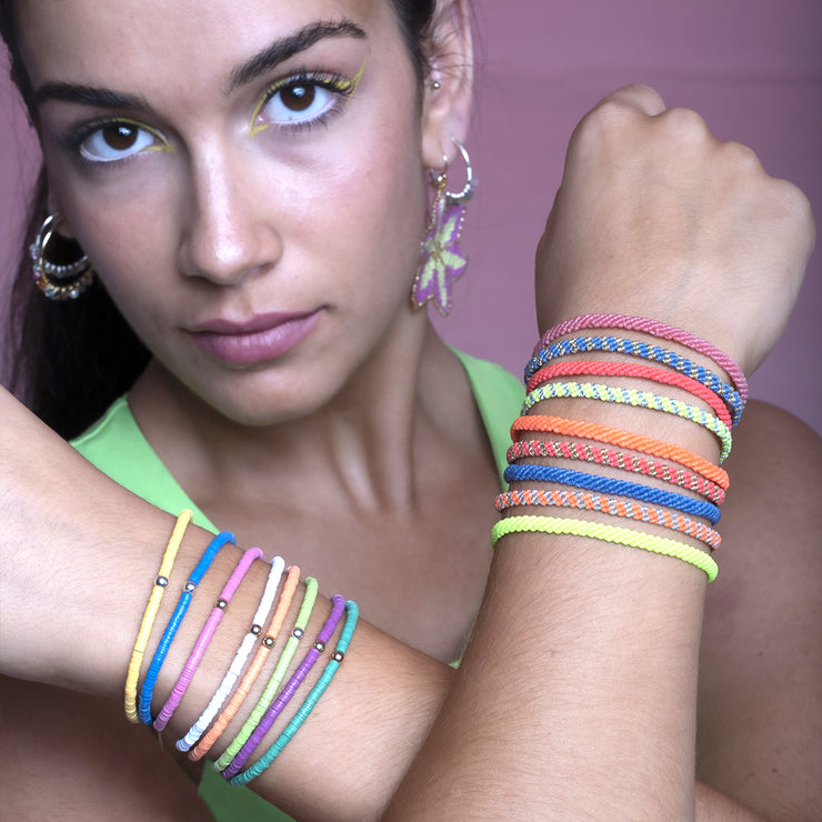 Handwoven Coral Bracelet In Green Featuring A Silver Bead