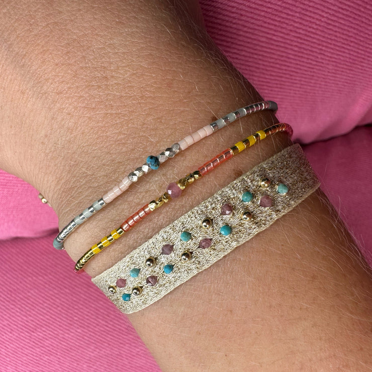  - Handwoven using Polyester  -Semi-precious stones  -14  gold filled beads  - Can be worn in the water - Width 8 mm -Adjustable bracelet -Women bracelet