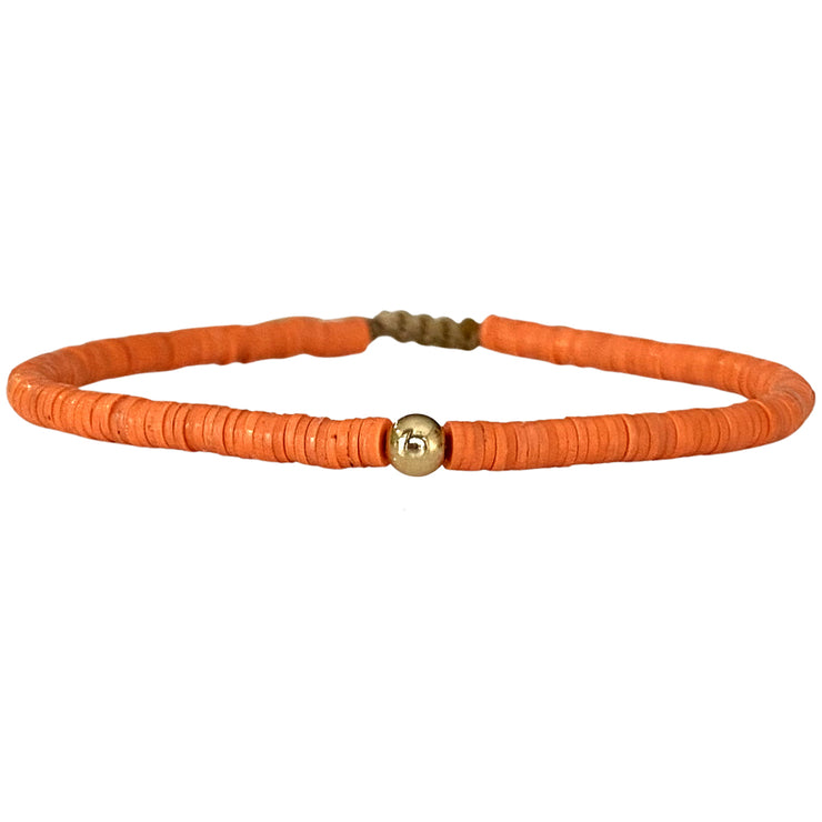 Handwoven Coral Bracelet In Orange Featuring A Gold Bead