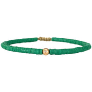 Handwoven Coral Bracelet In Green Featuring A Gold Bead
