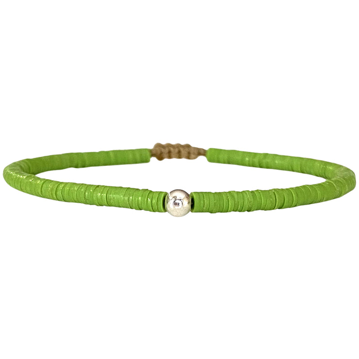 Handwoven Coral Bracelet In Green Featuring A Silver Bead