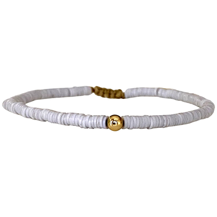 Handwoven Coral Bracelet In White Featuring A Gold Bead