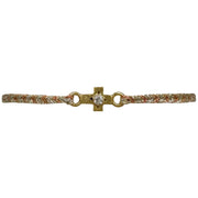 This delicate bracelet is handmade by our team of master artisans using metallic threads and a gold cross charm encrusted with a beautiful zircon stone. It's the perfect accessory to add a little sparkle in your life.  Details:      Zircon semi-precious stone     Gold Vermeil setting     Women bracelet     Adjustable handwoven bracelet     Width 5mm
