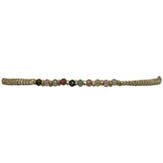 The Best Things In Life Are Unique, Affordable And Long Lasting. Style Your Look With This Unique Handwoven Bracelet.  This design is handmade by our team of master artisans using metallic threads, vermeil beads and watermelon tourmaline semi-precious stones.  Details:  -Watermelon tourmaline semi-precious stones  -Vermeil faceted beads  -Metallic threads in gold  -Adjustable bracelet   -Handmade Bracelet  -Width: 2mm 