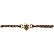 This delicate bracelet is handmade by our team of master artisans using metallic threads and a gold heart charm encrusted with a beautiful pink tourmaline stone. It's the perfect accessory to add a little sparkle in your life.  Details:      Pink tourmaline semi-precious stone     Gold Vermeil setting     Women bracelet     Adjustable handwoven bracelet     Width 5mm