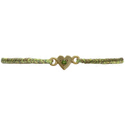 This delicate bracelet is handmade by our team of master artisans using metallic threads and a gold heart charm encrusted with a sparkling green tourmaline stone. It's the perfect accessory to add a little sparkle in your life.  Details:      Green Tourmaline semi-precious stone     Gold Vermeil setting     Women bracelet     Adjustable handwoven bracelet     Width 5mm