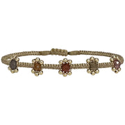 Add to your jewellery box this delicate and feminine design. This lilac bracelet is handwoven using metallic threads, Hessonite semi-precious stones and 14k gold filled beads creating little flowers to adorn your wrist.   Wear it with your favourite accessories !  Details:  - Hessonite semi-precious stones  -14k gold filled beads   -Handwoven using  metallic threads  -Adjustable bracelet   -Width: 5mm  - Can be worn in the water