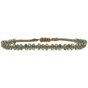 HANDMADE MARA BRACELET FEATURING TURQUOISE STONES AND GOLD DETAILS