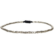 This cool bracelet is handmade by our team of masters artisans using italian wax threads and silver beads. A great gift idea for someone special as this amazing design it is a fashion must have.  Details:  -Men's bracelet  -Italian wax threads  -Sterling silver details  -Adjustable bracelet   -Width 2mm  -Can be worn in the water