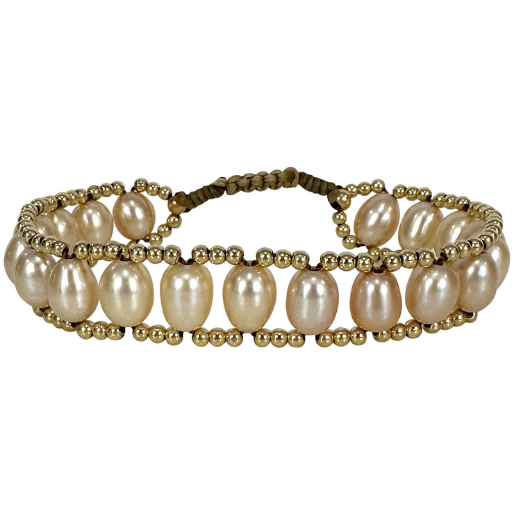 Indulge in the elegance of "Cassia" and let the natural beauty of freshwater pearls adorn your wrist. Elevate your look, exude confidence, and embrace the allure of handmade craftsmanship with this exquisite bracelet.