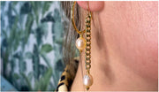 Long Golden Earrings With A Pearl Detail