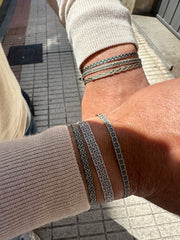 Perfect for adding a touch of refinement to any ensemble, the Men's Bracelet with Details is a timeless and stylish accessory that completes any look with effortless charm. Add a touch of sophistication to your everyday style with this exquisite piece.
