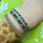 Abril Handmade Bracelet in Black and Golden Tones