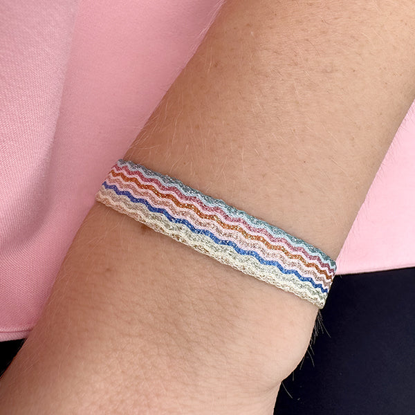 This magnificent design is handwoven using 160 threads, it takes for our master artisans 1 hour and 20 minutes to weave each bracelet. Details:  - Handwoven using Polyester  - Can be worn in the water - Width 8 mm  -Adjustable bracelet  -Women bracelet