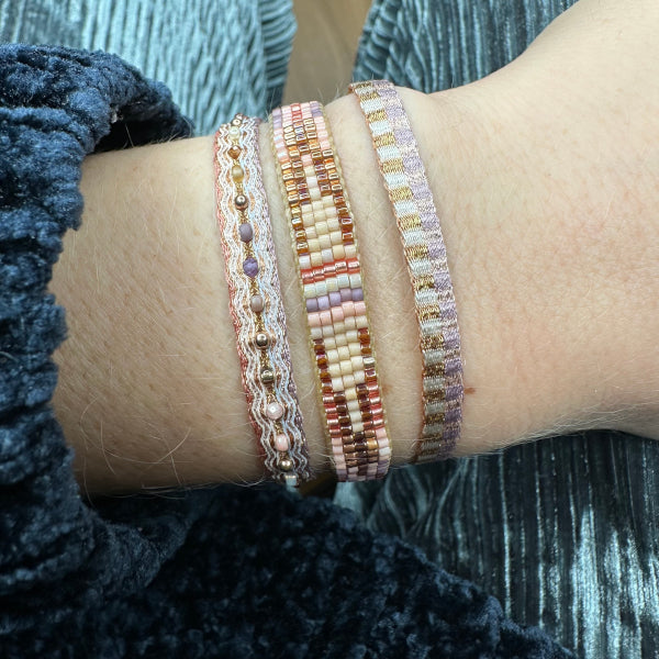 This beautifully bold set of three bracelets truly is "jewellery to make you smile". Using traditional artisanal handcrafting, each bracelet is hand-woven with techniques that take plenty of time and love. Wear yours stacked together or split between both wrists.  Details:      Japanese glass beads     Handwoven adjustable bracelet     Width 8mm, 5mm     Can be worn in the water