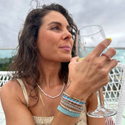 This LeJu bracelet has been handwoven in Colombia by our team of artisans using polyester threads featuring pink opal, turquoise and pink tourmaline stones.  A delicate bracelet in an elegant design. This handmade beauty is the perfect gift for someone special.  Details:  - Pink opla, turquoise and pink toumaline semi-precious stones  - Handwoven using polyester threads  - Width 3mm  -Women bracelet  - Adjustable bracelet  -Can be worn in the  water