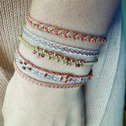 HANDMADE SET FO TWO BRACELETS IN PASTEL TONES AND GOLD