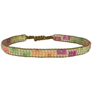   This cool bracelet is handwoven by our team of artisans in Colombia using Japanese glass beads.   Wear it with your favourite accessories !  Details:      Japanese glass beads     Handwoven adjustable bracelet     Width 5mm     Can be worn in the water