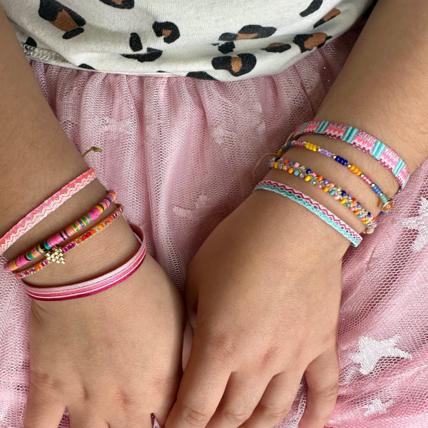  Barcelet Bliss!! This handmade wonder is the perfect splash of color and joy for the little ones!! They will never want to take them off, so let them play and play all day long!!  Details:  -Handmade Bracelet for kids  - Handwoven using Polyester  -Can be worn in the water - Width 3mm  -Can be worn in the  water