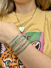 Peacock Handmade Bracelet Featuring Golden Tones and Turquoise Stones