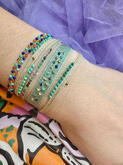 Peacock Handmade Bracelet Featuring Golden Tones and Turquoise Stones