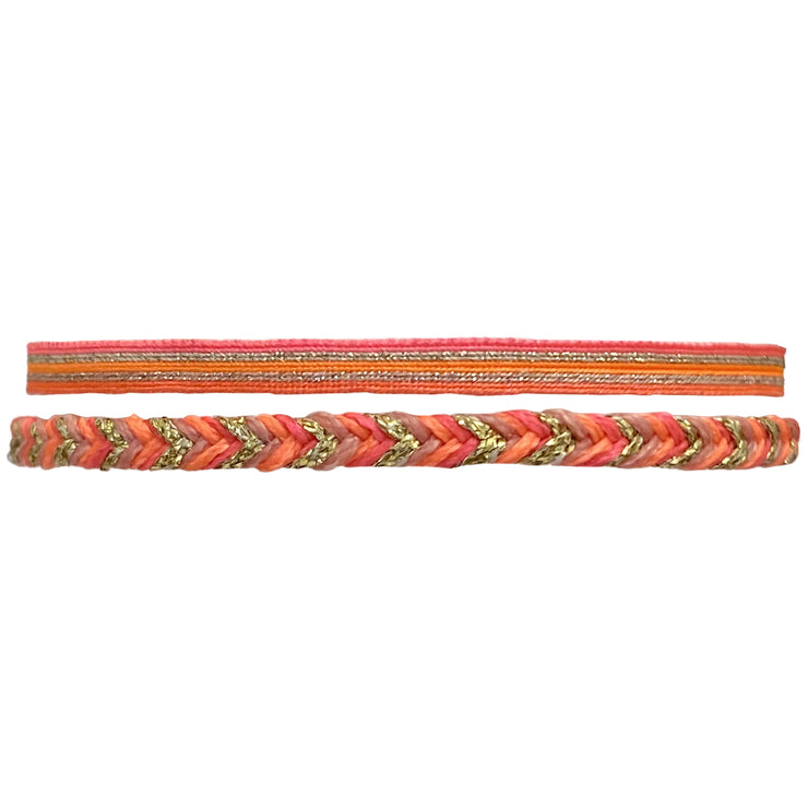  This beautifully bold set of two bracelets truly is "jewellery to make you smile". Using traditional artisanal handcrafting, each bracelet is hand-woven with techniques that take plenty of time and love. Wear yours stacked together or split between both wrists.  Details:      Polyester threads     Handwoven adjustable bracelet     Width 3mm, 3mm     Can be worn in the water