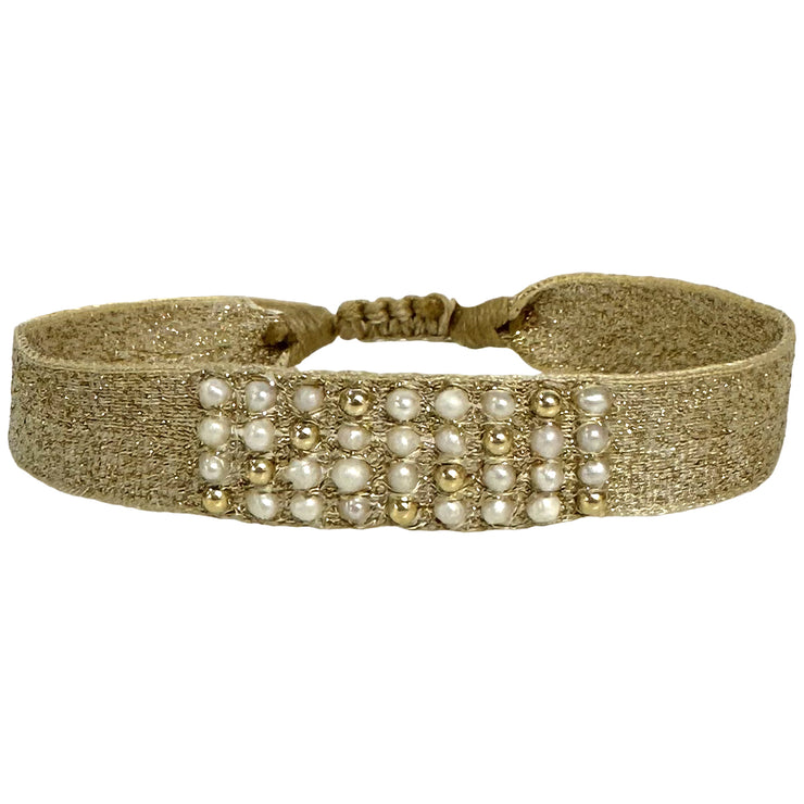 This Rosario Handmade Bracelet exudes elegance with its lustrous pearls and 14k gold filled beads. Handcrafted with care, it adds a touch of sophistication to any outfit.