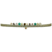 HANDMADE PEACOCK BRACELET IN GREEN TONES FEATURING GEMSTONES DETAIL AND A GOLD BEAD