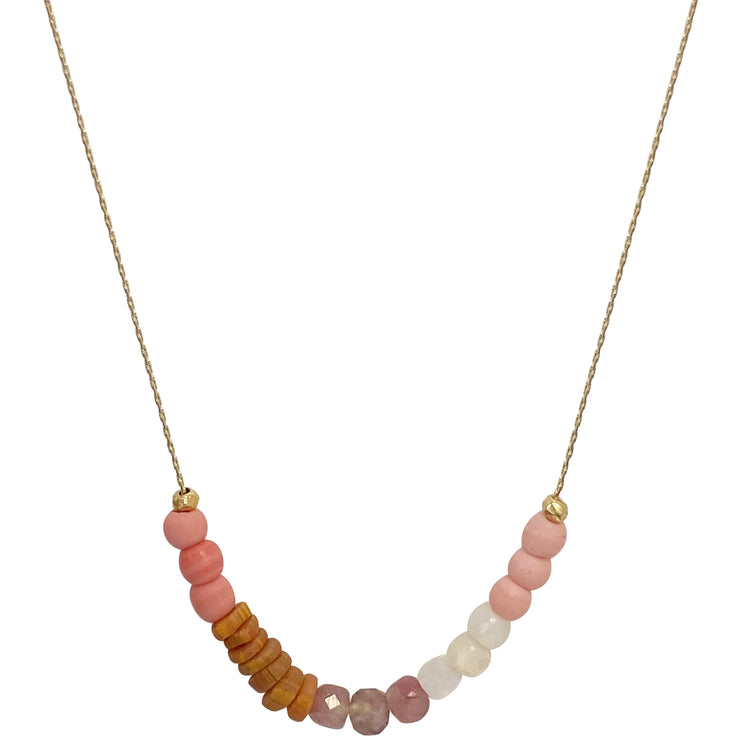 This beautiful necklace is handmade by our team of master artisans using a 14k gold filled chain, African Beads, Pink Opal & Pink Tourmaline semi-precious stones  Simple and elegant, this colorful necklace is the perfect accent for any outfit.     Details  African Beads, Pink Opal & Pink Tourmaline semi-precious stones  Handmade necklace  Lenght: 40cm Extender chain: 2,5 cm  14 k filled Chain