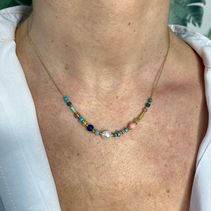 This beautiful necklace is handmade by our team of master artisans using a 14k gold filled chain, Jade, Turquoise, Freshwater pearl, Citrine, Peach Sunstone, Lapis Lazuli & African beads. Simple and elegant, this gold necklace is the perfect accent for any outfit.     Details  Jade, Turquoise, Freshwater pearl, Citrine,Peach Sunstone, Lapis Lazuli & African beads  Ha