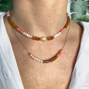 HANDMADE GOLD NECKLACE FEATURING INTERMIXED SEMI-PRECIOUS STONES AND AFRICAN BEADS