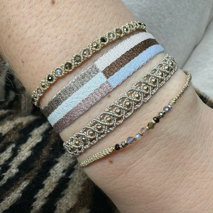 This magnificent design is handwoven using 160 threads, it takes for our master artisans 1 hour and 20 minutes to weave each bracelet. Details:  - Handwoven using Polyester  - Can be worn in the water - Width 8 mm  -Adjustable bracelet  -Women bracelet