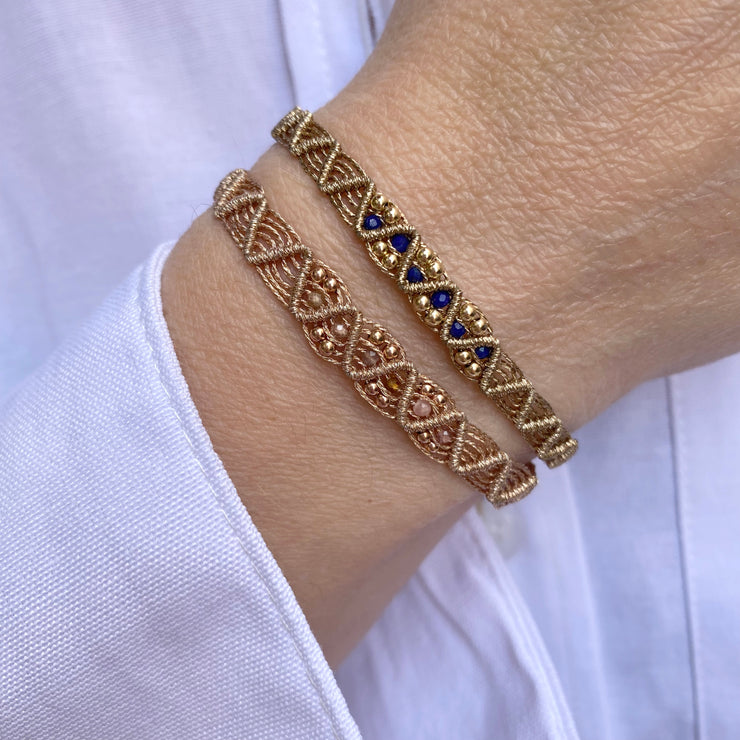 Cool, unique and feminine, this handmade bracelet design is handwoven using a macrame technique, 14K gold filled beads and lapis lazuli semi precious stones.   Treat yourself to a graceful, elegant and refined piece of jewelry that is sure to make you feel beautiful and confident.  Details:  - Handwoven using metallic threads  - Lapis lazuli semi-precious stones.  - 14K gold filled beads    - Adjustable Bracelet  - Width: 6mm  -Can be worn in the water