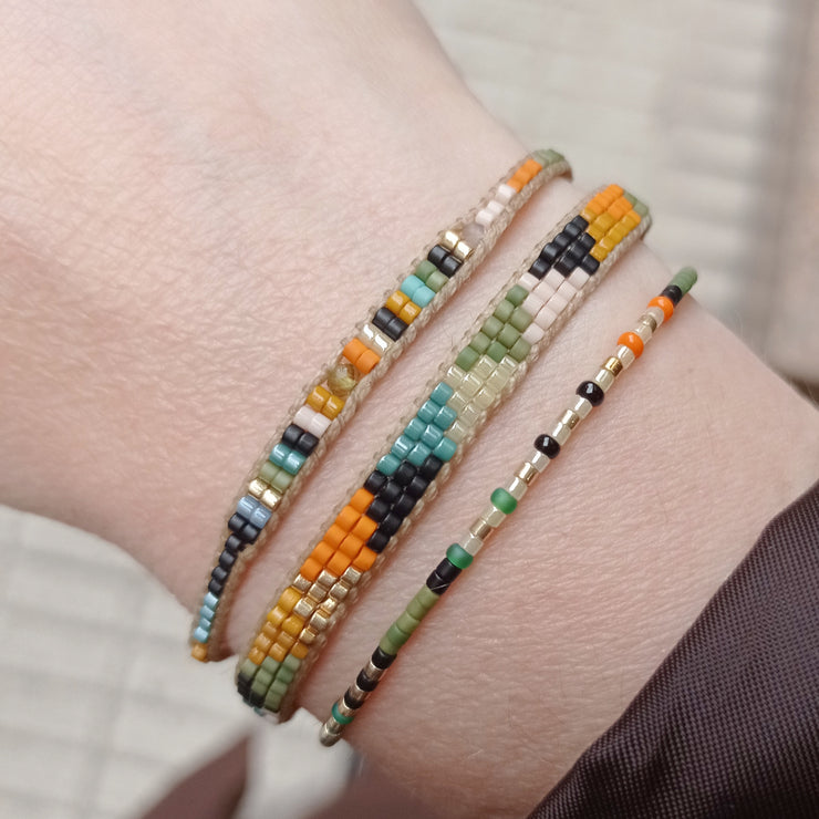 Details:      Women Bracelet     Japanese glass beads     Handwoven adjustable bracelet     Width 5mm     Can be worn in the  water
