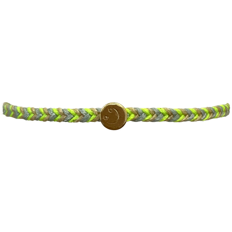 HAPPY HANDMADE BRACELET IN NEON COLOURS FEATURING A GOLD SMILEY CHARM