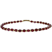 This delicate jewel is handmade using 14kt gold filled beads and Almandite semi-precious stones. This beauty will be one of your favorite bracelets as you can wear it with any accessories or outfits. Give to your looks a touch of elegance and sparkle !  Details:  - Almandite semi-precious stones   - 14kt gold filled beads  -Adjustable bracelet  -width: 2mm