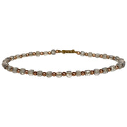 This delicate jewel is handmade using rose gold filled beads and Labradorite semi-precious stones. This beauty will be one of your favorite bracelets as you can wear it with any accessories or outfits. Give to your looks a touch of elegance and sparkle !  Details:  - Labradorite semi-precious stones   - 14 K rose gold filled beads  -Adjustable bracelet  -width: 2m  -Can be worn in the water