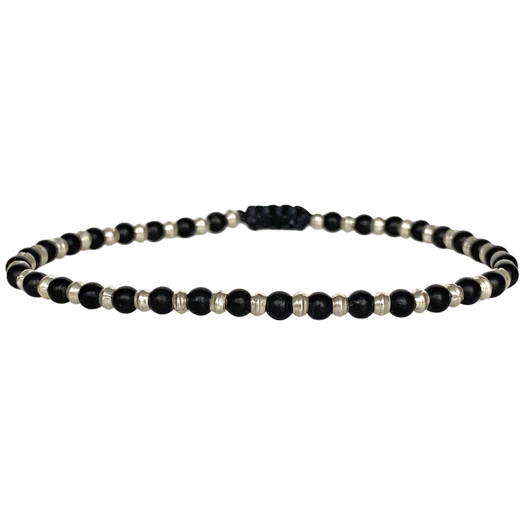 his cool bracelet is handmade by our team of masters artisans with black onyx stones and silver beads. A great gift idea for someone special as this amazing design it is a fashion must have.  Details:  -Men&