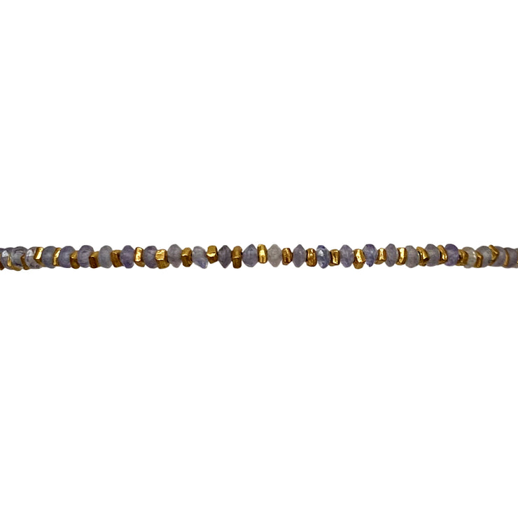 - Tanzanite Stones  - Vermeil faceted beads  - Width 2mm  -Women bracelet  - Adjustable bracelet  -Can be worn in the  water