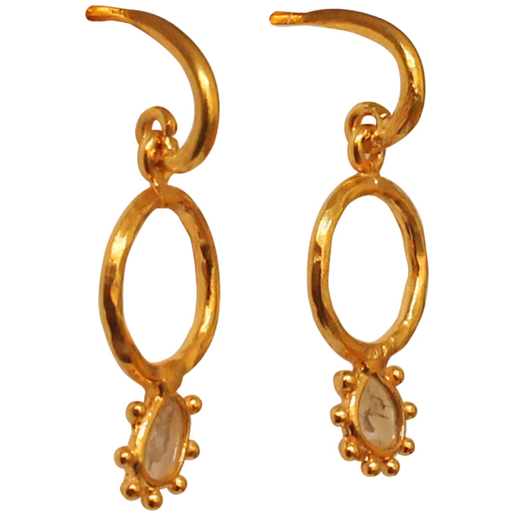 These fine and beautiful handmade drop earring featuring sliced diamonds, set in a 14k vermeil setting. The perfect pair of earrings to wear for any occasion!  -Metal: 14k gold plated vermeil   -Sliced rough diamonds  -Earring height 1.8cm, Width 0.9mm  -Butterfly closure  -Care: Take care of your jewellery by keeping it dry and avoid spraying fragrances directly on to it.   -It comes with a card and a gift box   -Each piece has a unique shape as they are natural gemstones 