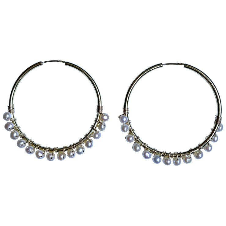 Chic & Elegant, Casual & Versatile.  Elevate your look with these gorgeous hoops.  Details:  - Handmade earrings  -  24K Gold vermeil hoop on 925 sterling silver   -Hoop diameter: 40mm   -Freshwater pearls   