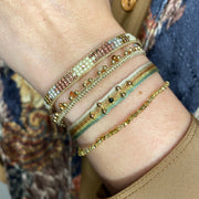  - Tsavorite Stones  - Vermeil faceted beads  - Width 2mm  -Women bracelet  - Adjustable bracelet  -Can be worn in the  water