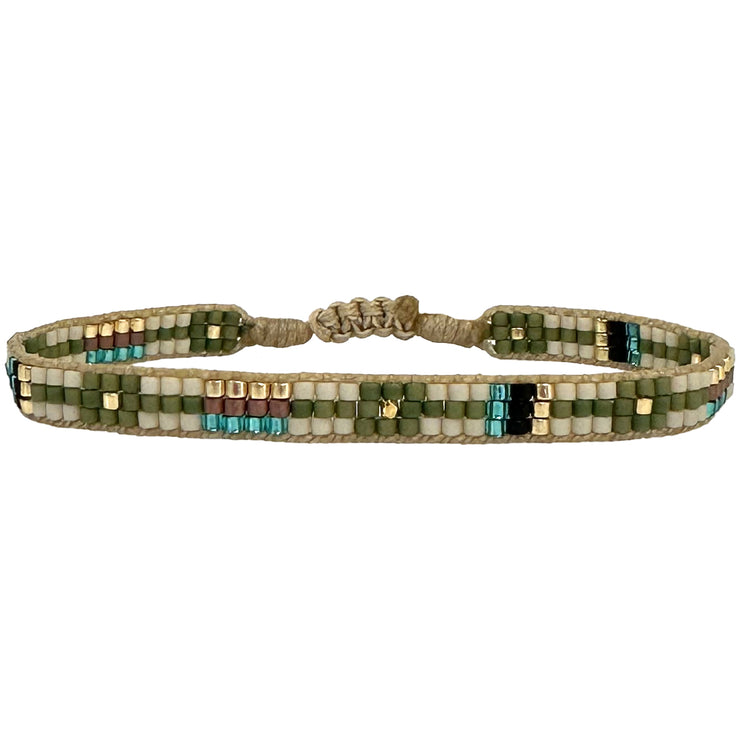 This cool bracelet is handwoven by our team of artisans in Colombia using Japanese glass beads.   Wear it with your favourite accessories !  Details:      Women Bracelet     Japanese glass beads     Handwoven adjustable bracelet     Width 5mm     Can be worn in the  water