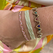HANDMADE SET OF 3 BRACELETS IN GOLD AND BRIGHT TONES WITH GOLD AND GEMSTONES DETAIL