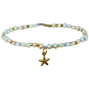 Sea Stars have incredible abilities, they can regenerate and in some cases, entire bodies, they represent new life, guidance and infinite divine love.   This Anklet is handmade from freshwater pearls intermixed with glass beads and a detailed 18-karat Gold vermeil Sea Star charm.   Details:  - Adjustable to your desired fit