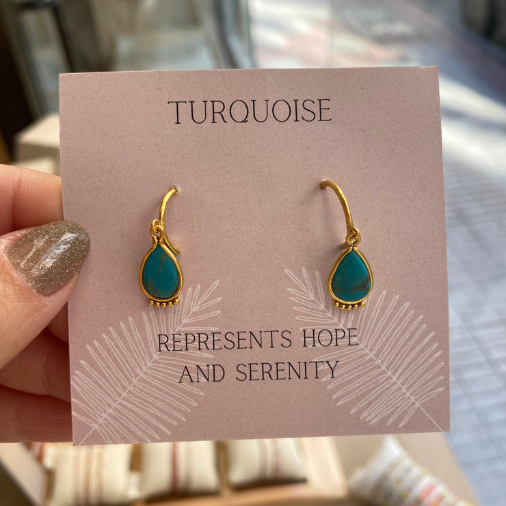 These beautiful handmade earrings featuring Turquoise stone representing hope and serenity, set in 14k gold vermeil setting. Bold and classic   -Metal: 14k gold plated vermeil   -Gemstone: Turquoise  -Earring height 1.5cm, Width 0.9mm  -Butterfly closure  -Care: Take care of your jewellery by keeping it dry and avoid spraying fragrances directly on to it.   -It comes with a card and a gift box   -Each piece has a unique shape as they are natural gemstones 