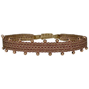   This beautiful hadmade bracelet has been handwoven in Colombia by our team of artisans using Polyester threads in burgundy tones with 14k rose gold filled beads.  This can be worn solo or with your favourite pieces.  Details:      Polyester threads     14k rose gold filled beads     Handwoven adjustable bracelet     Width 5mm     Can be worn in the water     Women bracelet