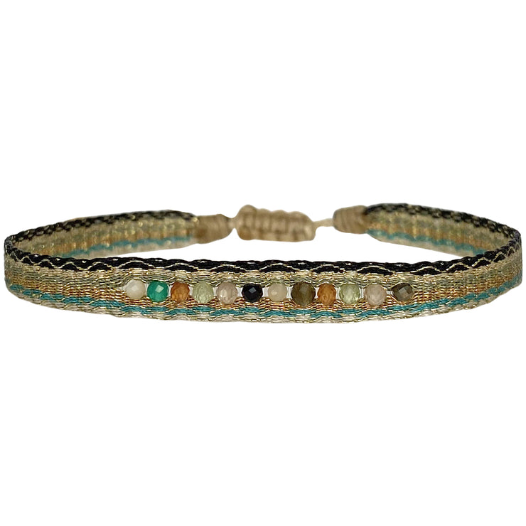 This bracelet is handmade by our team of master artisans using polyester threads and intermixed semiprecious stones. LeJu’s handwoven bracelets are an effortlessly cool everyday choice.  Wear it solo or stack it with similar styles.  Details:  - Polyester threads  - Intermixed semi-precious stones  - Italian wax thread  - Adjustable Handwoven Bracelet  - Width 6mm  - Can be worn in the water