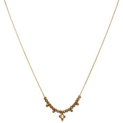 This gorgeus necklace is designed to be layered with other styles from and looks beautiful on its own, too. It's handmade using a 14k gold filled chain, brown Zircon semi-precious stones and a sliced diamond on a vermeil setting as a center piece    14 K gold filled chain and clasp closure Vermeil beads charms Measures 42cm + 2cm extension Handmade necklace